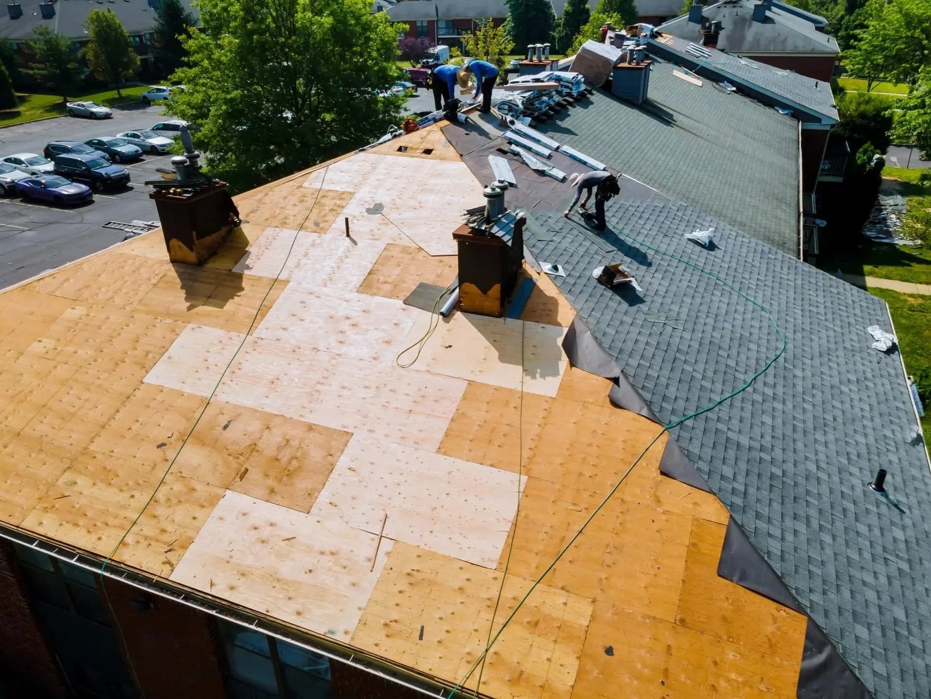 Roofing crew installing a new roof