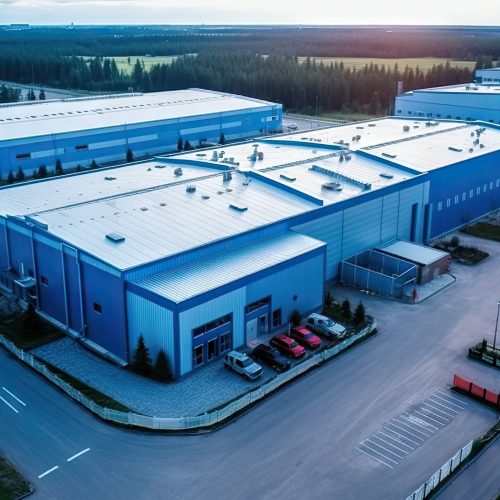 Aerial view of the industrial factory. Top view of distribution warehouse and storage